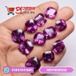 Multiple faceted cushion-cut purple Alexander Alexandrite gemstones arranged on an open hand by Proyojonstore