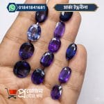 Collection of natural oval cut Marca Blue Sapphire gemstones displayed on palm - Proyojonstore