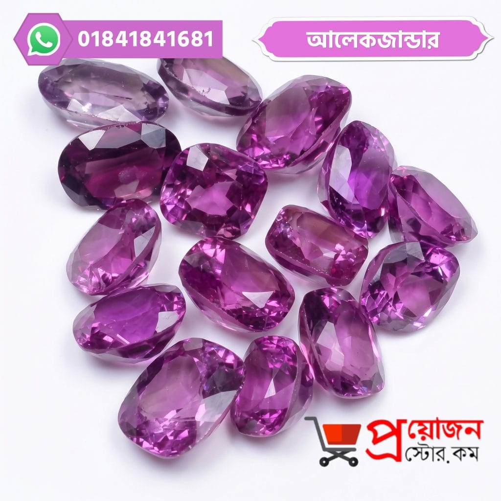 Bulk lot of loose faceted purple-violet oval and cushion cut Alexander Alexandrite gemstones on a white background by Proyojonstore