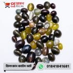 Bulk lot of loose polished oval natural green, yellow, and black Srilankan Cat's Eye gemstone cabochons on a white background by Proyojonstore