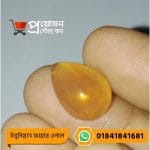 Close-up of a smooth translucent pear-shaped honey-orange natural Ethiopian Fire Opal gemstone held between fingertips by Proyojonstore