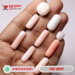 Multiple shapes and sizes of Italian White Coral stones (শ্বেত প্রবাল পাথর) displayed on a hand by Proyojonstore
