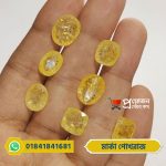 Multiple faceted oval and cushion cut bright yellow Marka Yellow Sapphire gemstones displayed on an open hand by Proyojonstore