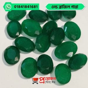 Bulk lot of loose faceted oval deep green natural Old Brazil Emerald gemstones arranged on a white background by Proyojonstore